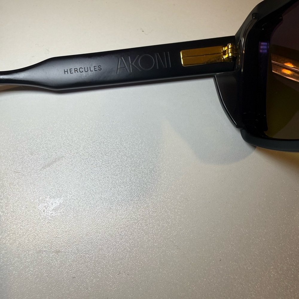Akoni Black Sunglasses with Gold Detail